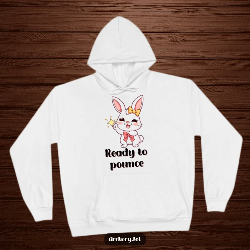 Funny hoodie depicting a joyful rabbit aiming a sparkly bow, radiating warmth and happiness, ideal for cozy, humorous moments.