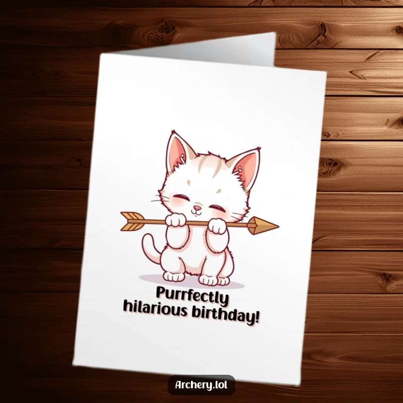 Funny Free Printable Birthday Card: A cute, playful kitten batting at an arrow, creating a humorous and lighthearted birthday greeting.
